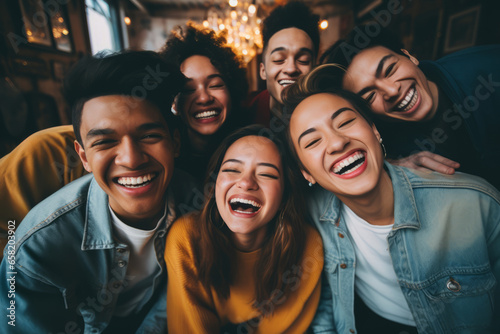 Happy group of young people smiling at camera outdoors - Smiling friends having fun hanging out on city street - University students standing together taking selfie. - Friendship and team concept