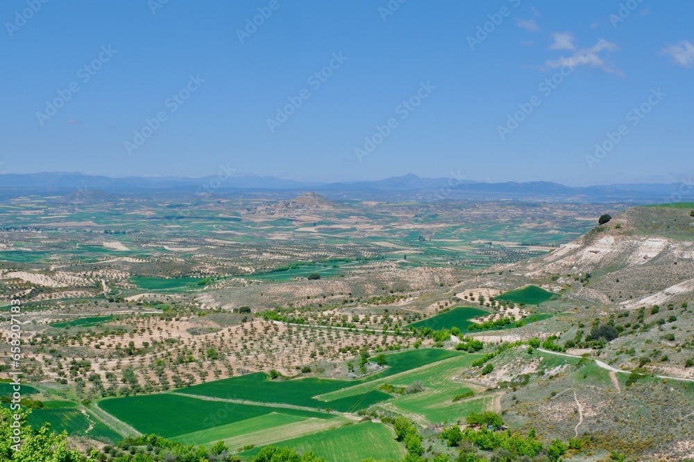 Panorama of the vivid green landscape. Aerial view from lookout Balcon de La Alcarria in Trijueque village, Guadalajara community, Spain