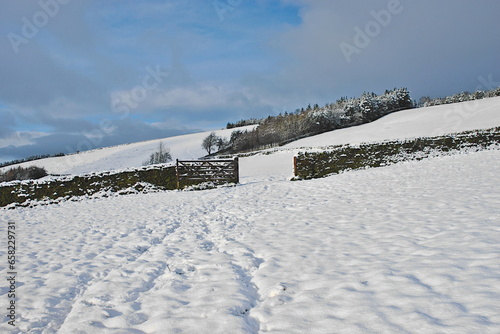 Snowy Winter Wonderland at the Fold in Lothersdale, The Yorkshire Dales, North Yorkshire, England, UK photo