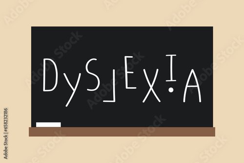 A blackboard with a word dyslexia written on it. photo