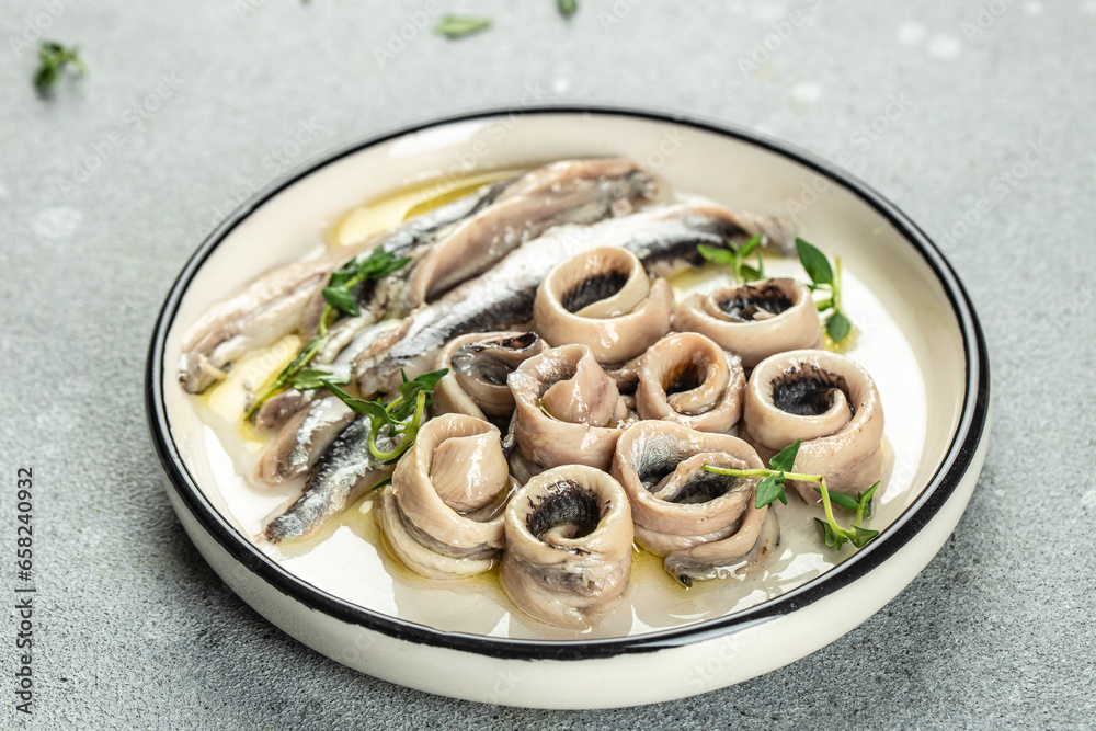 Anchovies marinated in vinegar with olive oil, Food recipe background. Close up