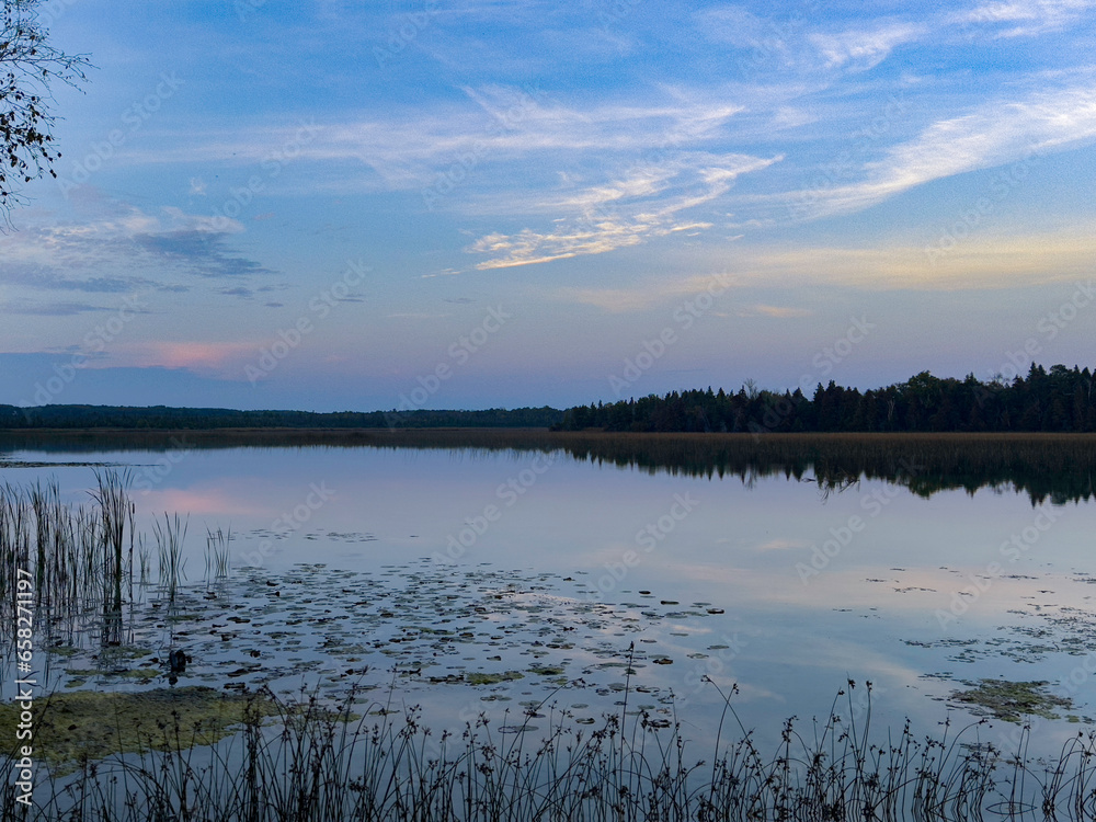 Fototapeta premium sunset over the lake
