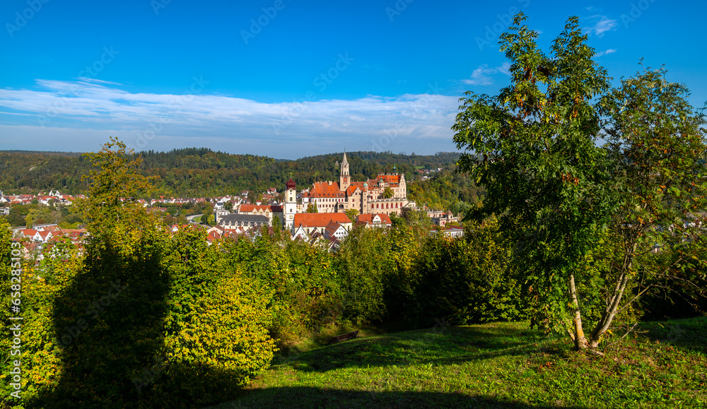 Sigmaringen panorama from a hill above old town with historic monuments and landmarks. Picturesque city on river Danube in southern Germany with famous historic castle. Tourist attractions and sights.