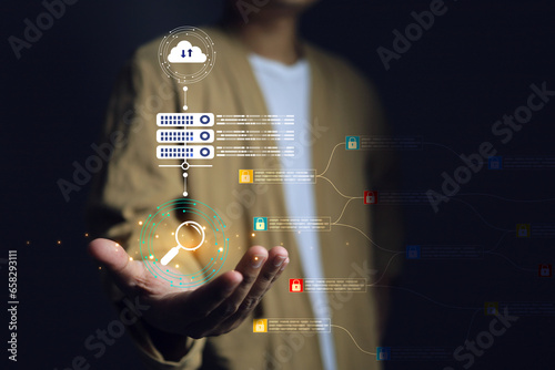 Hand holding magnifying glass to search data on internet via server connecting to cloud data system and security technology. SEO search engine optimization concept.