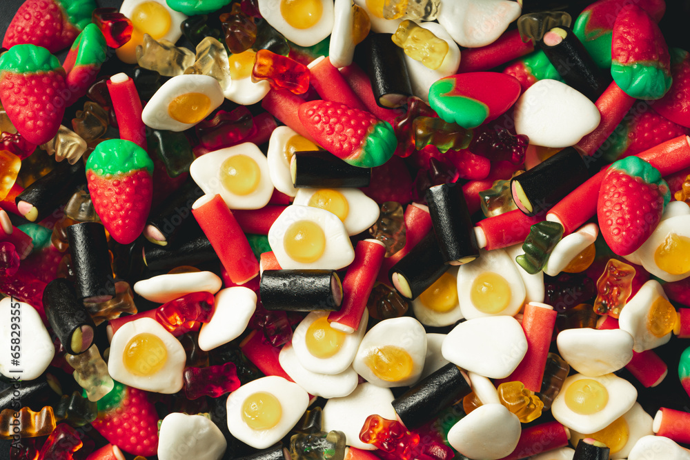 mountain of candy strawberries licorice and fried eggs