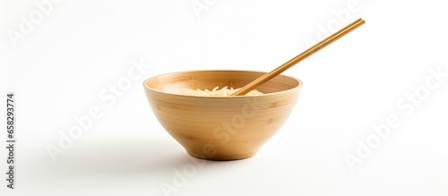 Eco friendly bowl made from natural fiber with chopsticks on white background promoting sustainability