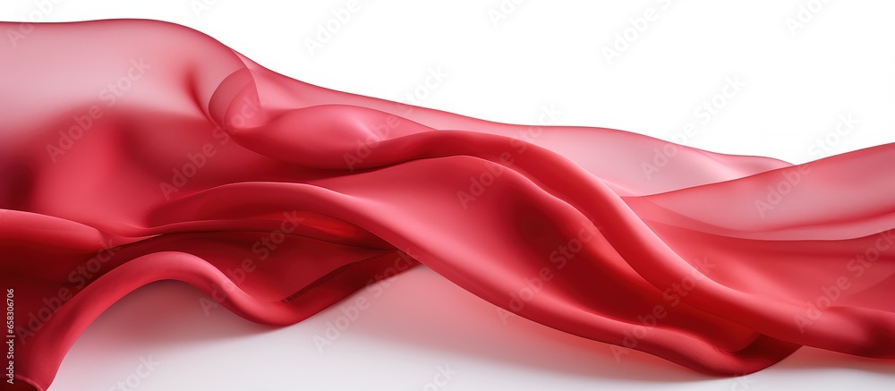Obraz premium Flying red fabric with smooth elegant texture against white background