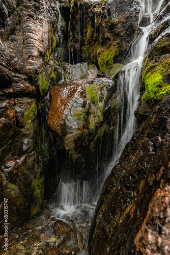 a small waterfall in the mountains