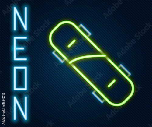 Glowing neon line Brass knuckles icon isolated on black background. Colorful outline concept. Vector