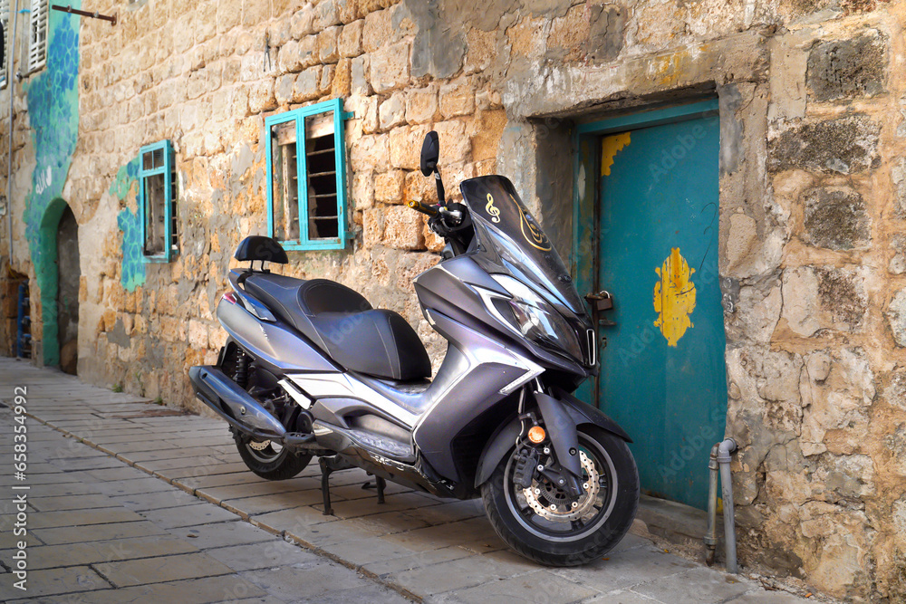 Streets of the old town, tourist attraction, motorbike and electric bike rental