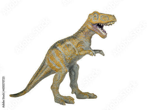Dinosaur tyrannosaurus figurine toy isolated on white background close-up
