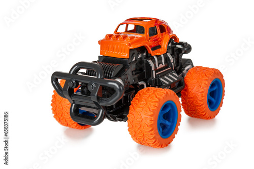 Bigfoot toy car isolated on white background close up, of toys for boys big wheels