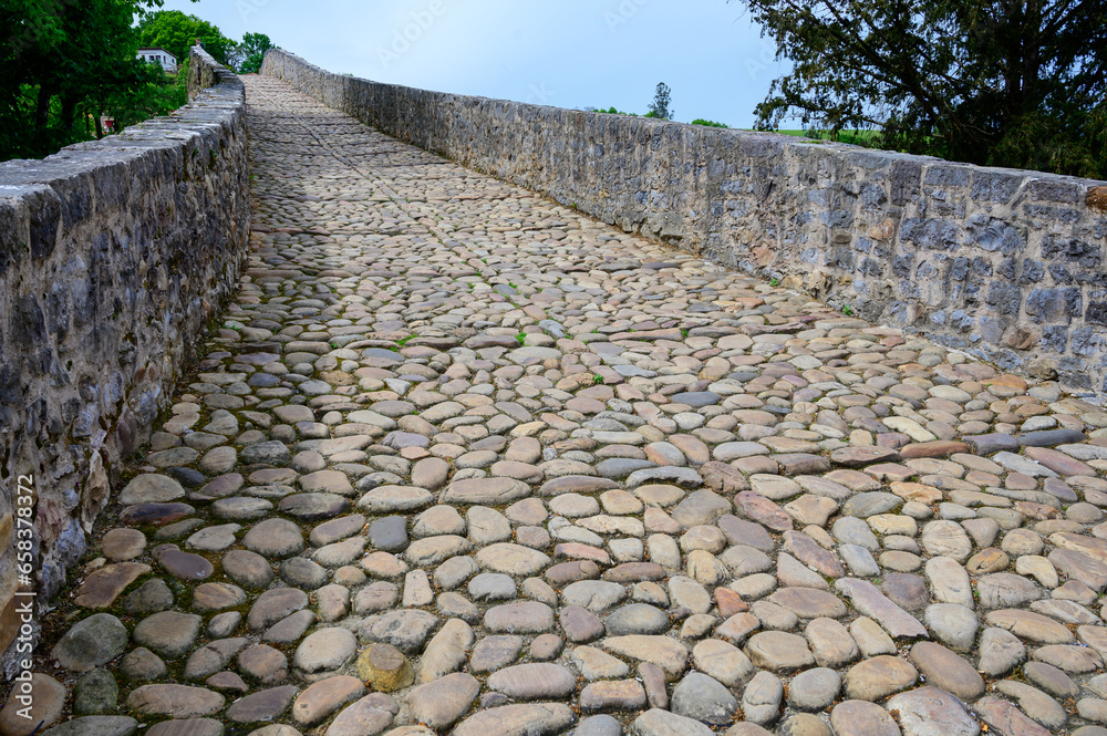 Cangas de Onis, mountain village with old roman ruins and bridge, Picos de Europa mountains