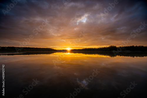 A beautiful orange sunset set over the lake