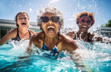 
Active aging. An energetic group of elderly women having fun swimming in an outdoor pool by the sea. Leads an active lifestyle. This is the path to longevity in the golden age