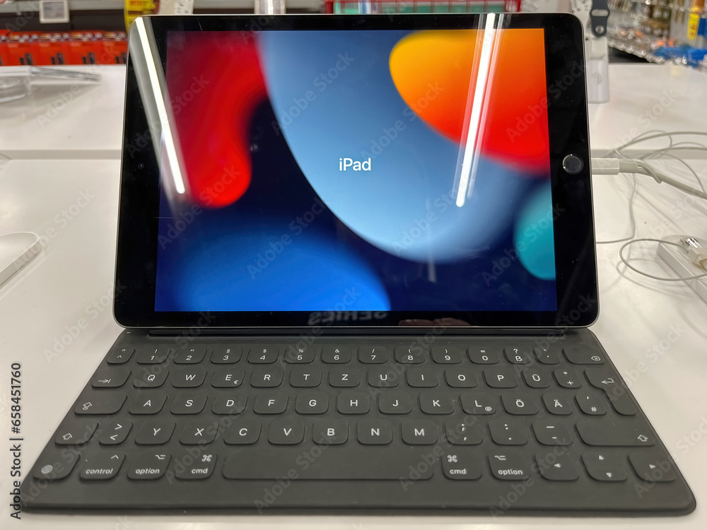 iPad with a keyboard attachment showcased at an electronics store in Germany, Stock Photo