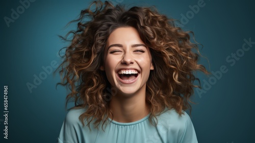 Sunny Disposition: Young Woman Grins with Pure Joy on Solid Color Background