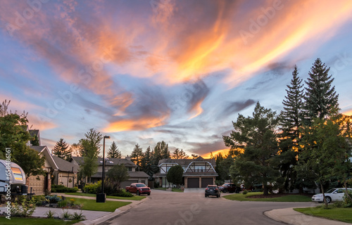 Sunset view in cul-de-sac city landscape with triangle shape clouds