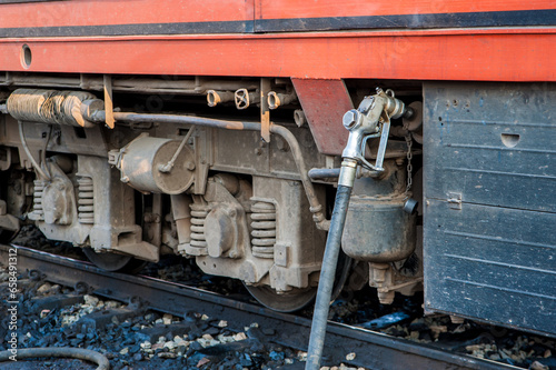 The train is refueling at the station.