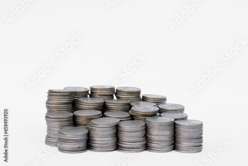 Closeup stack of silver coins on white background,Save money.