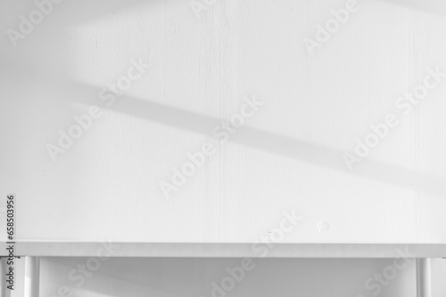 Wallpaper Mural Empty white desk with morning light and shadows of windows with copy space, summer concert. Blurred backdrop abstract background for display product. Torontodigital.ca