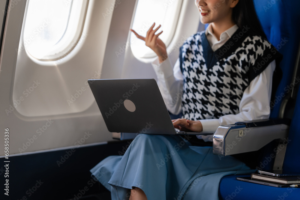 Passionate female asian chinese japanese people student aboard airplane, clutching textbooks, eagerly anticipating her overseas academic venture. Passionate female asian chinese japanese people student aboard airplane, clutching textbooks, eagerly anticipating her overseas academic venture.