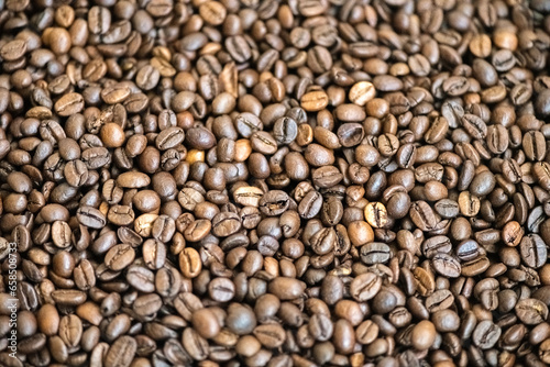 Freshly roasted delicious coffee beans close-up.