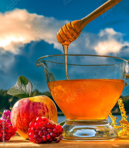 Close up with jar or jug of honey, apple and seeds of pomegranate - symbols o...