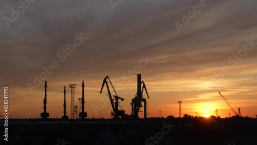 Fifteen port cranes go to rest on Sunday after a hard day's work