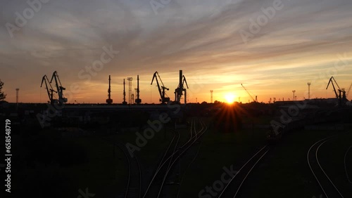 Incredibly colorful sunset after a busy day at the port