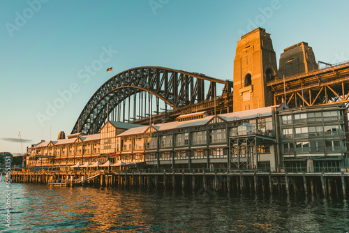 View of Sydney's most famous bridge. the harbor bridge at golden hour from walsh bay