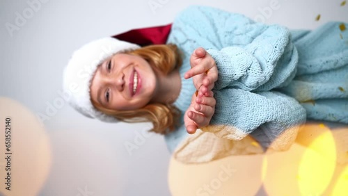 girl santa cap colorful confetti