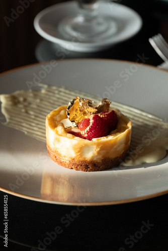 Wallpaper Mural Delicious Fruit Cheesecake on Plate: Tempting Dessert with Freshness and Flavor Torontodigital.ca