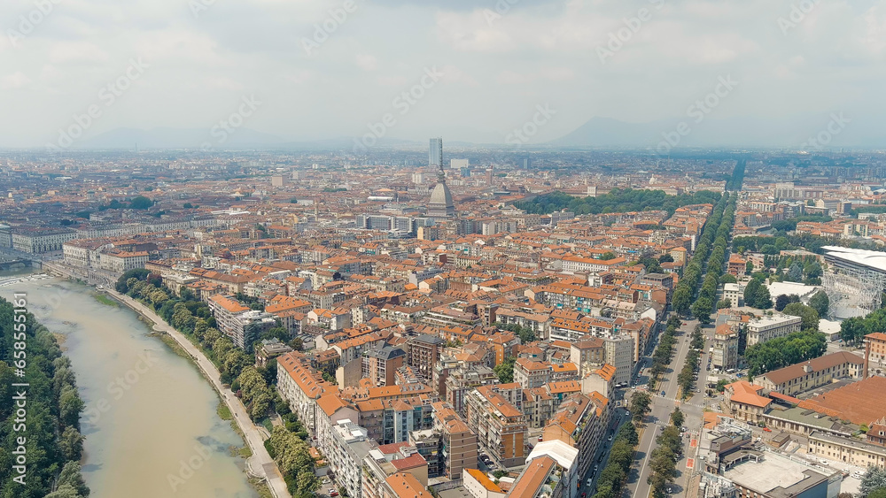 Turin, Italy. Spire of Mole Antonelliana. Mole Antonelliana - Majestic building from the 19th century. Panorama of the city. Summer day, Aerial View