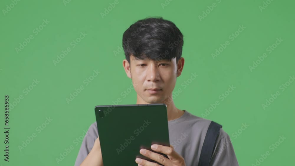 Close Up Of Asian Man Worker Using A Tablet While Walking In The Green Screen Background Studio
Close Up Of Asian Man Worker Using A Tablet While Walking In The Green Screen Background Studio