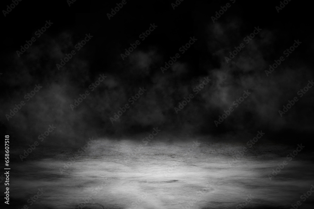 Concrete floor with smoke or fog in dark room with spotlight. Asphalt night street, black background, black and white