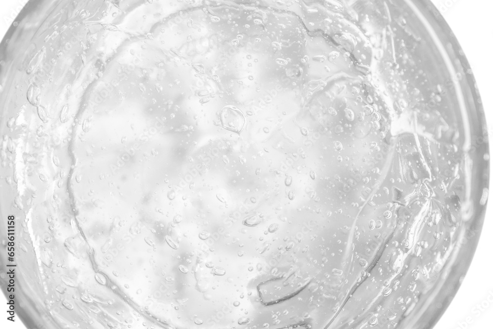 Transparent cosmetic gel in a round jar. View from above. On an empty background. Transparent cosmetic gel in a round jar. View from above. On an empty background.