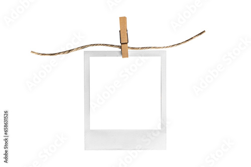 polaroid on clothespin / polaroid frame and clothespin attached to a rope isolated on white background 