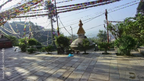 Steady cam moving through Monkey Temple of Nepal - Slow Motion
