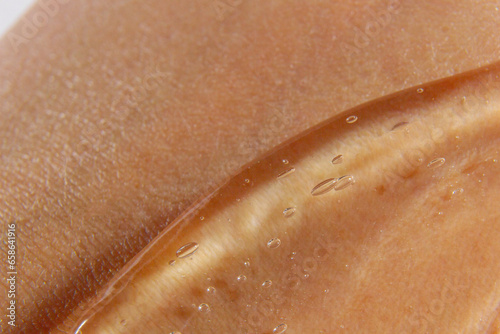 transparent cosmetic or medical gel smeared on the skin