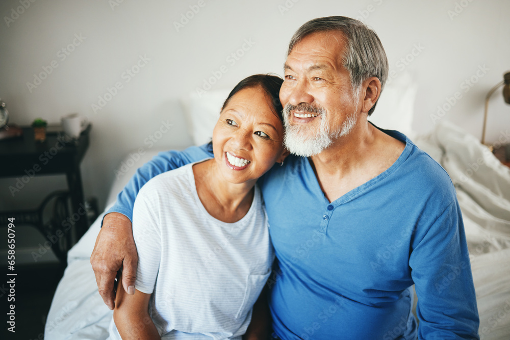 Senior, thinking or happy couple hug in house bedroom together to relax on holiday with bond or support. Embrace, lovers or romantic Asian man with a mature woman with love, smile or care in marriage Senior, thinking or happy couple hug in house bedroom together to relax on holiday with bond or support. Embrace, lovers or romantic Asian man with a mature woman with love, smile or care in marriage