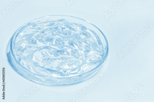blue transparent cosmetic or medical gel in a Petri dish