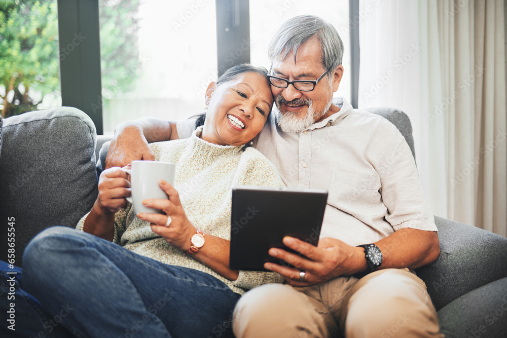 Tablet, coffee and senior couple on sofa bonding, relaxing and networking on social media together. Happy, digital technology and elderly man and woman in retirement scroll on mobile app or internet. Tablet, coffee and senior couple on sofa bonding, relaxing and networking on social media together. Happy, digital technology and elderly man and woman in retirement scroll on mobile app or internet.