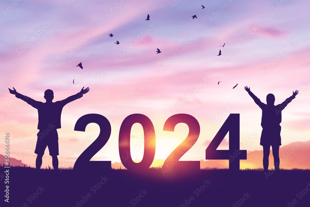 Couple raise hand up and number 2024 on sunset sky with birds flying at top of mountain and abstract background. Happy new year and holiday concept. Vintage tone effect color style. Couple raise hand up and number 2024 on sunset sky with birds flying at top of mountain and abstract background. Happy new year and holiday concept. Vintage tone effect color style.