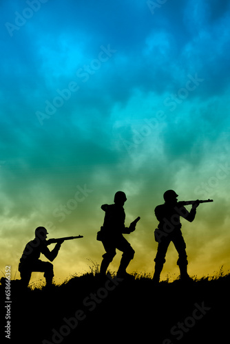 patrol of soldiers on a ridge, silhouettes