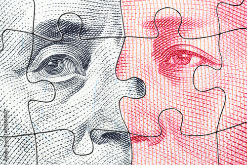 Trade tensions or trade wars between the US and China : Both American and Chinese banknotes prominently display the likenesses of historical figures, including Benjamin Franklin and Mao Zedong. photo