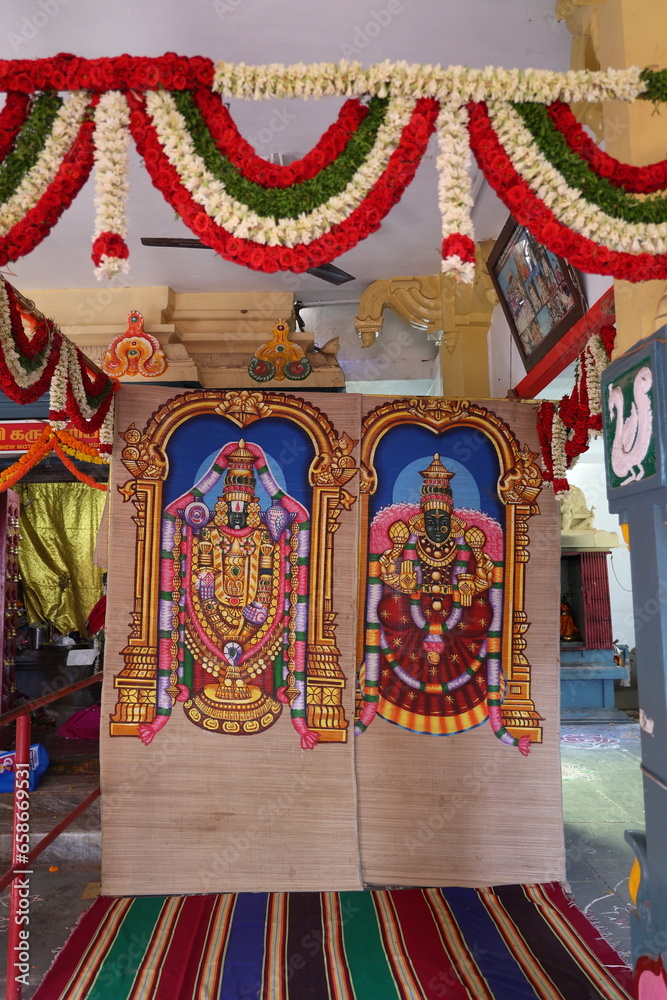 stage decoration with idols of lord Venkateswara and ambal in the background