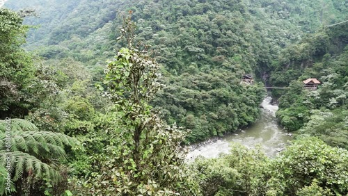 spectacular waterfall of El Pailon del Diablo close to Banos Santa Agua in the andes mountains of Ecuador, South America.
