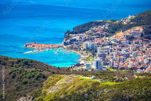 Town of Budva beach and modern coastline architecture view from hill