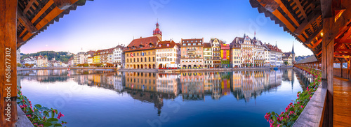 Tableau sur toile Luzern Kapelbrucke and riverfront architecture famous Swiss landmarks panoramic
